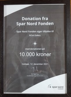 Bevis på donation fra Spar Nord Fonden på 10.000 kr. 